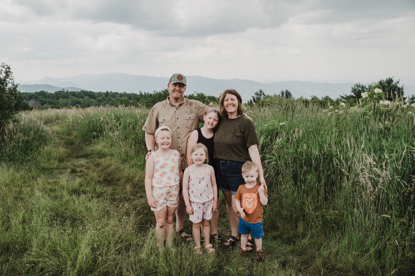 The Freedom Family Electric family of six in a mountain field