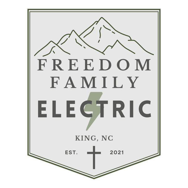 Freedom Family Electric badge logo — Pilot Mountain with cross, est. 2021